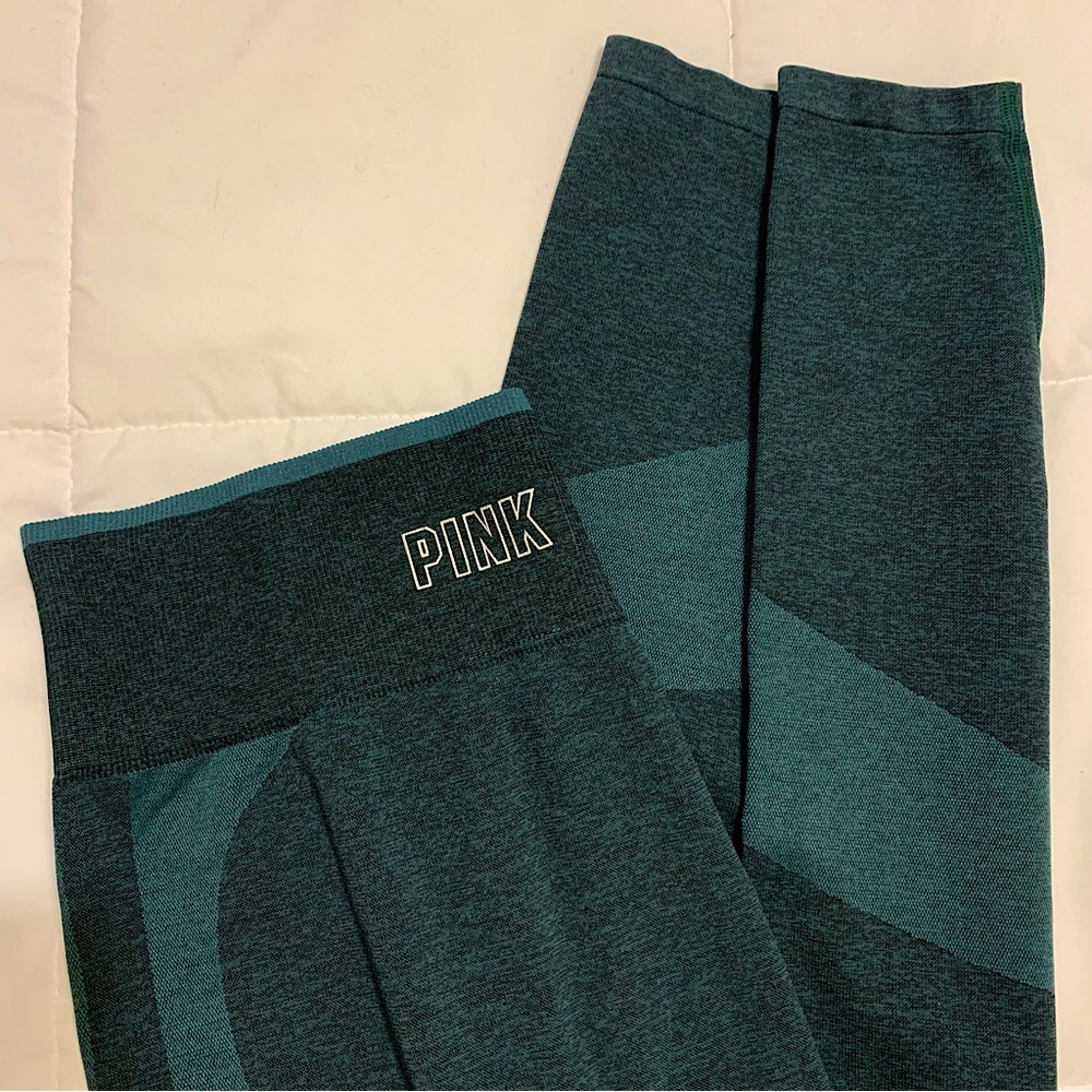 Victoria’s Secret: Pink Seamless leggings in Dark Ivy Marl; Green leggings